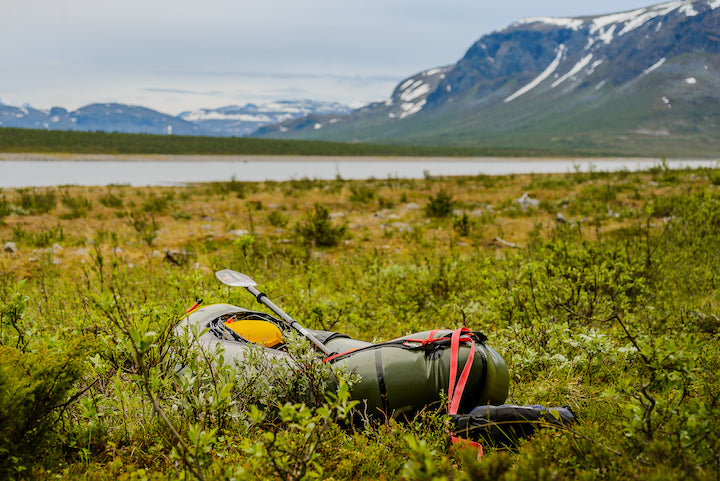 packraft on the ground in arctic swedish wilderness