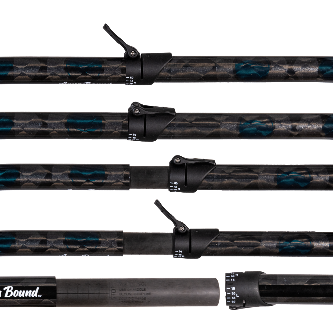 Center of Aerial Major Carbon Fiber 2-piece straight shaft whitewater kayak paddle with black, dark blue, holographic aqua bound graphic details on shaft, white graphic right and left feather angles adjustment located on Versa-Lok. Stages of  Reinforced Versa-Lok™ connection allows 5 cm of adjustable length and infinite offset feathering angles. Secure, tight locked connection that grips onto carbon ferrule insert. Do not extend past the 5 cm stop line graphic to avoid risk of damage or failure.