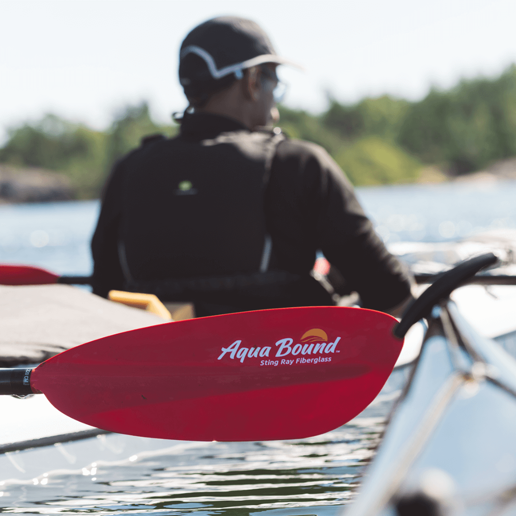 sting ray fiberglass 2-piece snap button sunset red close up on the water#color_sunset-red