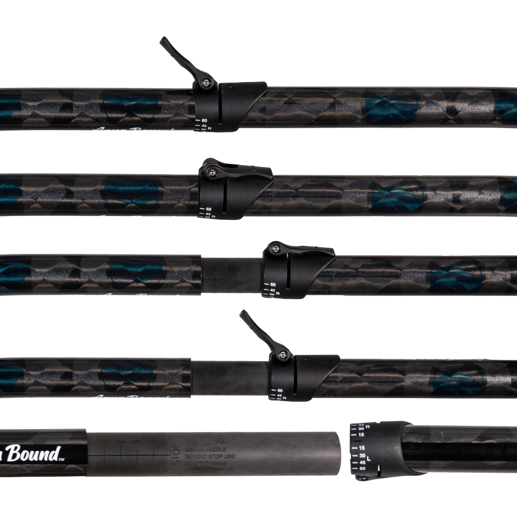 Center of Aerial Major Carbon Fiber 4-piece crank shaft whitewater kayak paddle with black, dark blue, holographic aqua bound graphic details on shaft, white graphic right and left feather angles adjustment located on Versa-Lok. Stages of  Reinforced Versa-Lok™ connection allows 5 cm of adjustable length and infinite offset feathering angles. Secure, tight locked connection that grips onto carbon ferrule insert. Do not extend past the 5 cm stop line graphic to avoid risk of damage or failure. 
