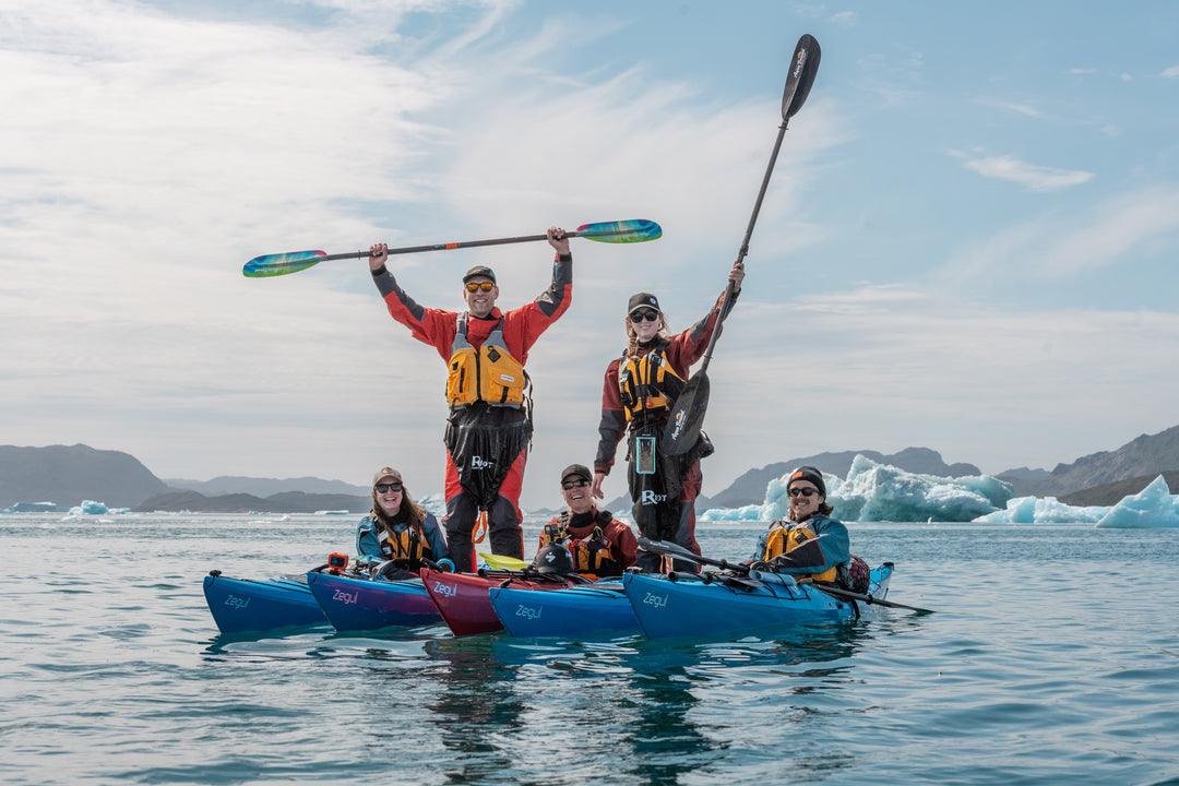 a group of people in a kayak