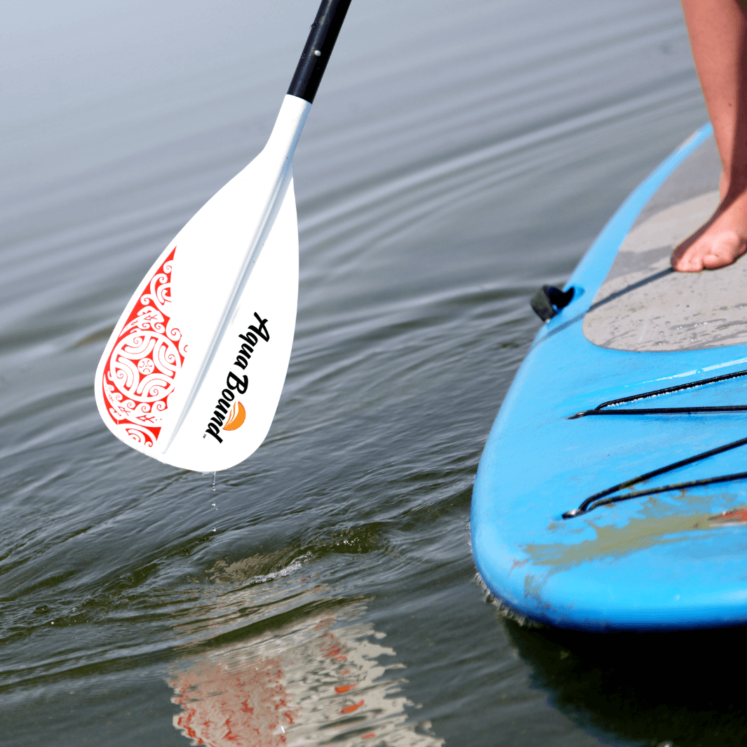 close up of paddler's feet on the paddle board paddling towards the camera with the Lyric 4-piece SUP paddle