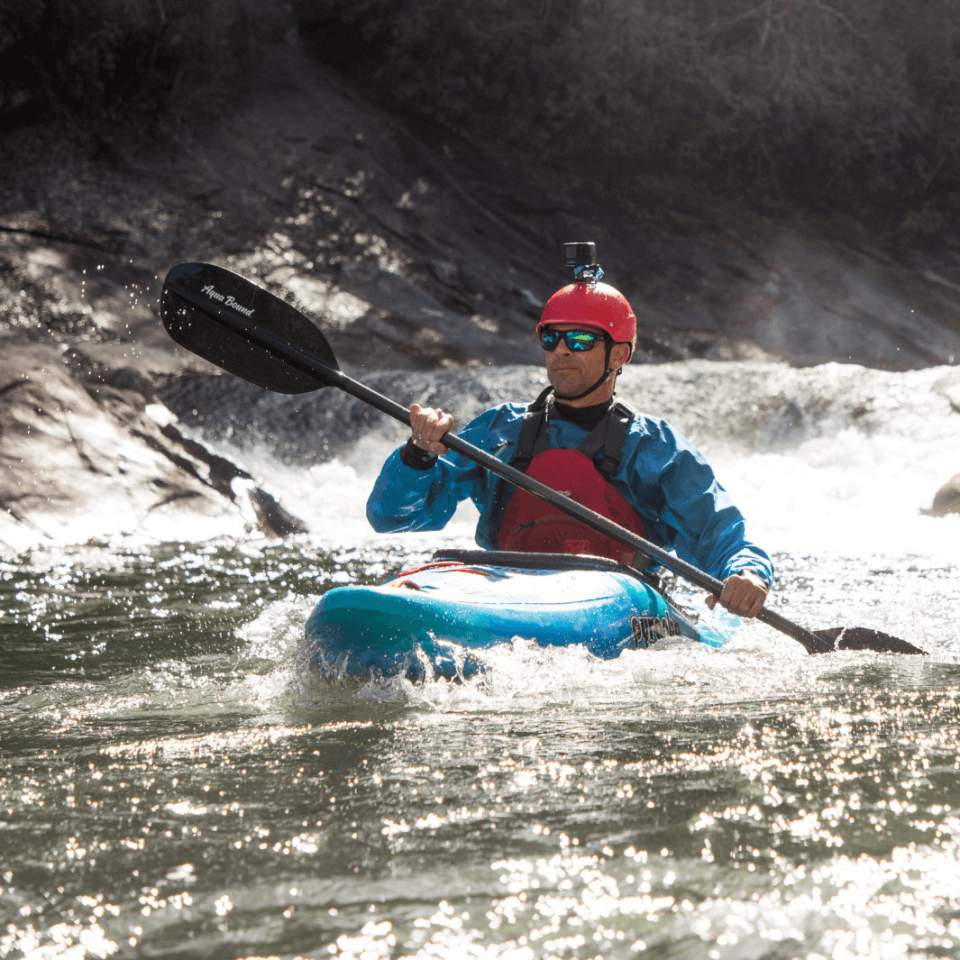 Ken Whiting paddling with the shred carbon