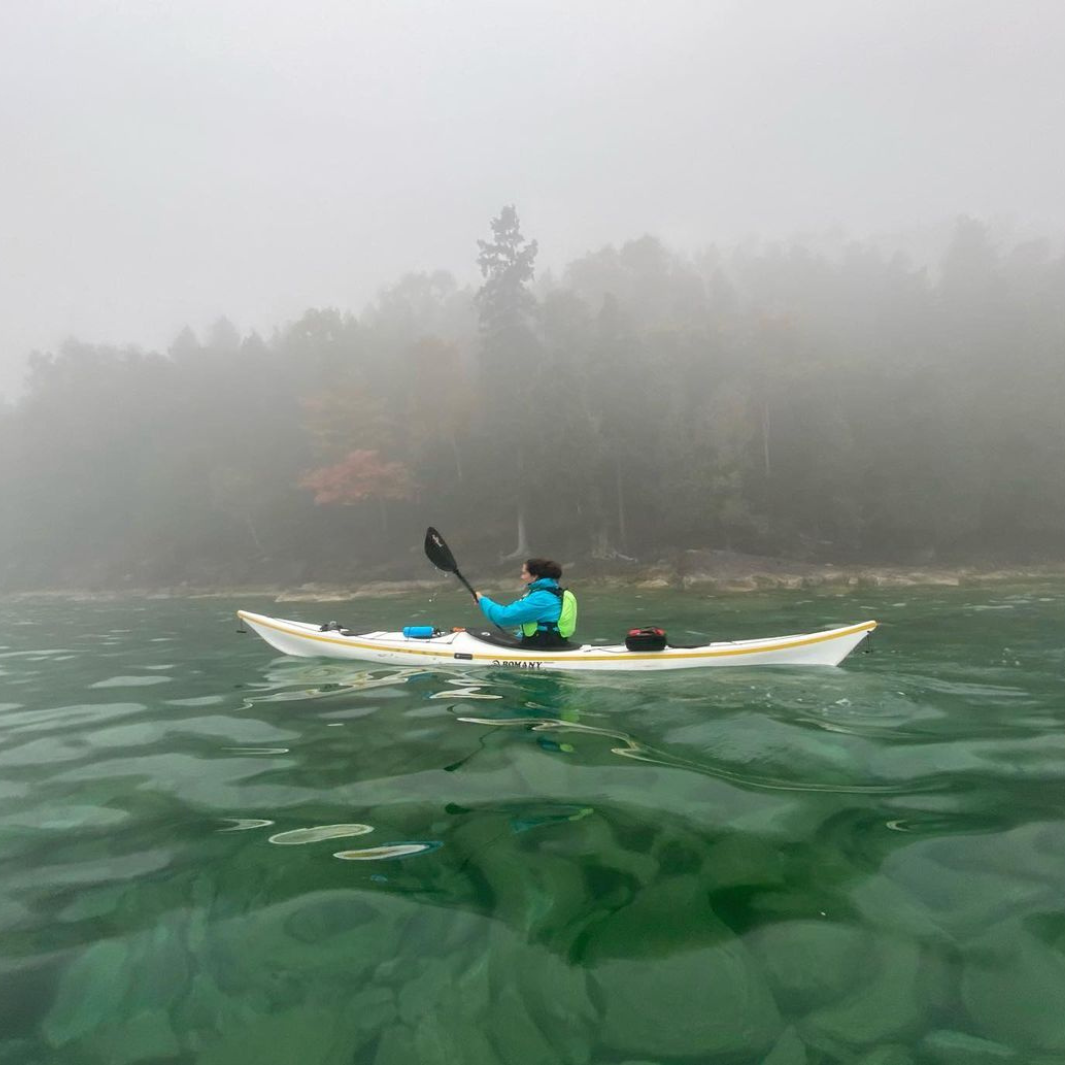 tango carbon 4-piece posi-lok kayak paddle foggy pine tree background clear waters