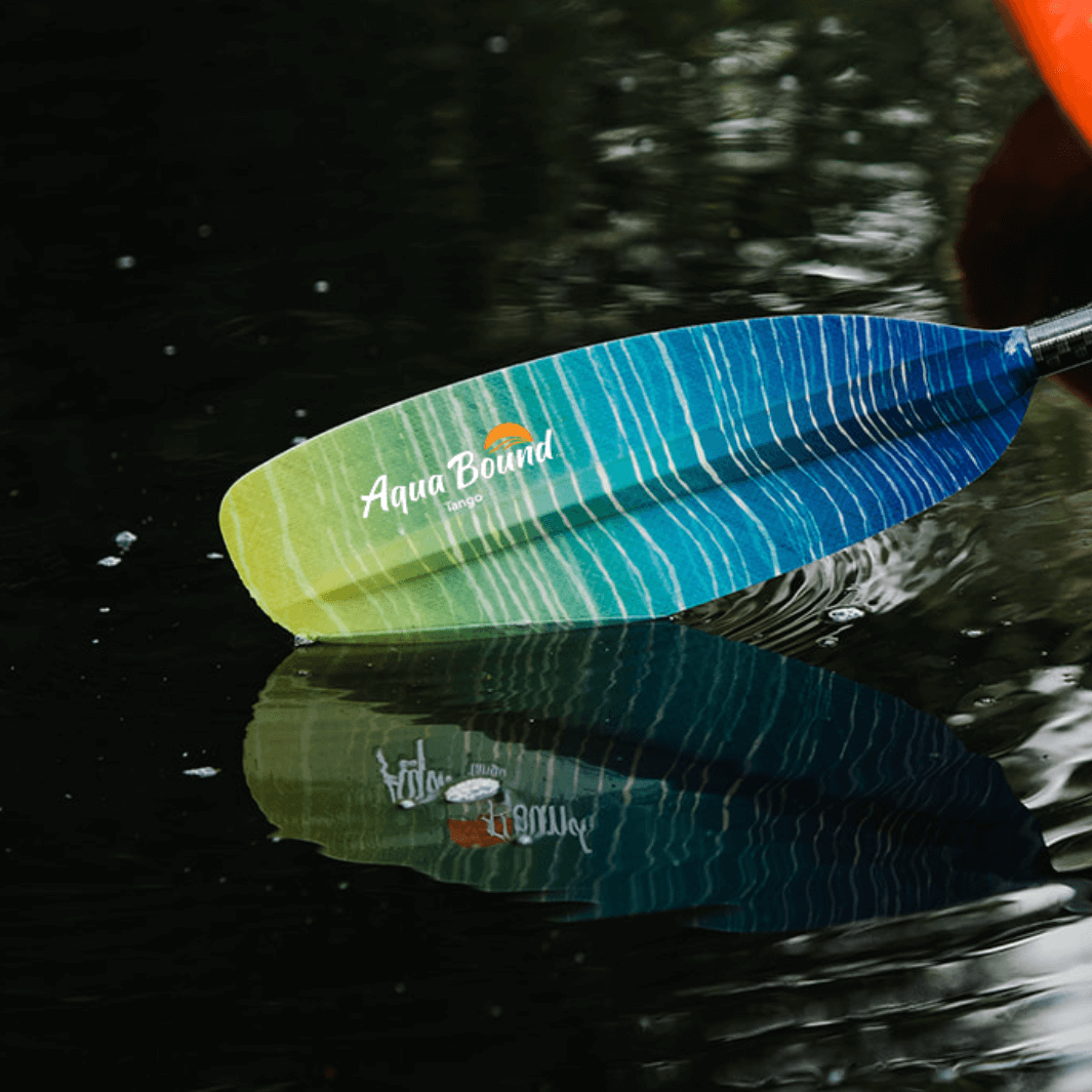 tango fiberglass 4-piece posi-lok kayak paddle sunwave blade partly in water#color_sunwave